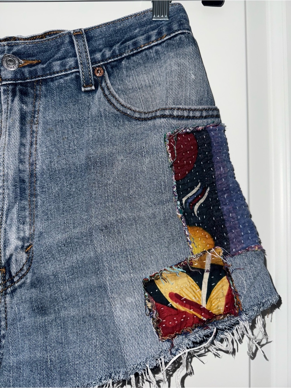 Levi’s Patchwork Denim Cutoff High Waisted Shorts - Picture 3 of 9